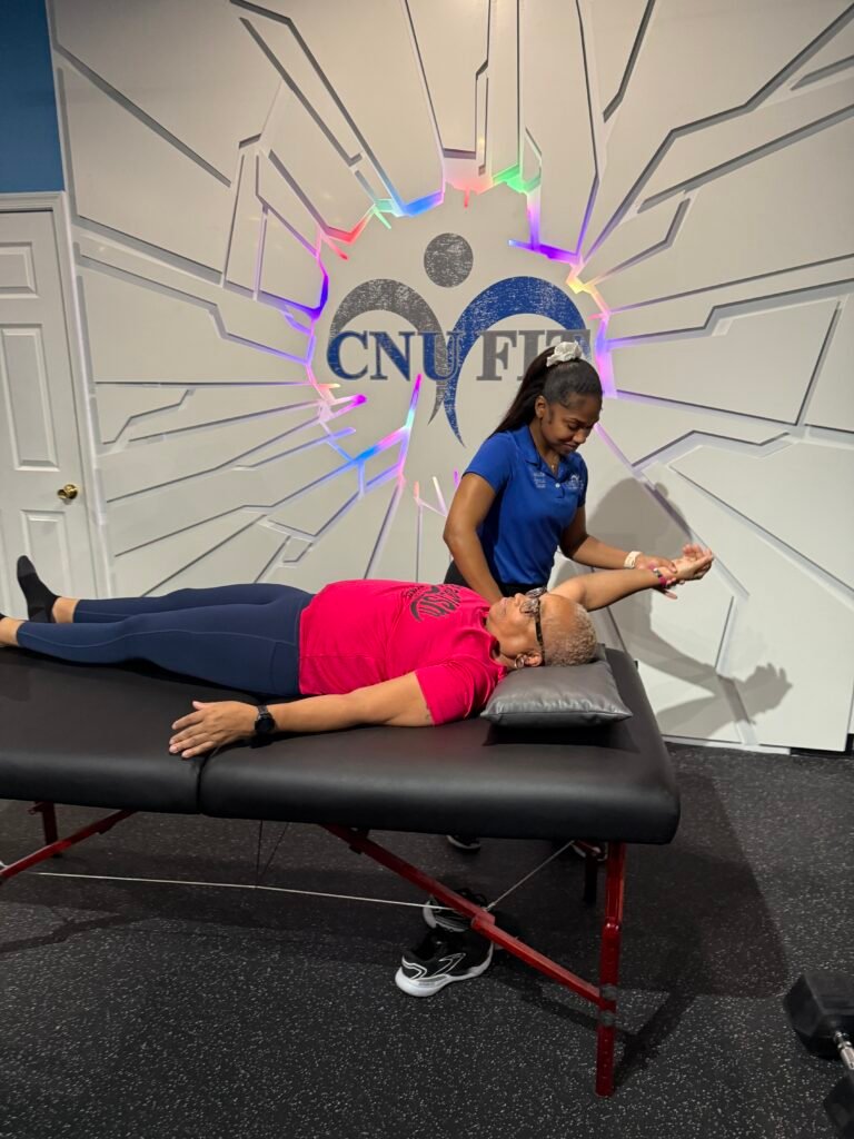 certified stretch therapist performing assisted stretch session